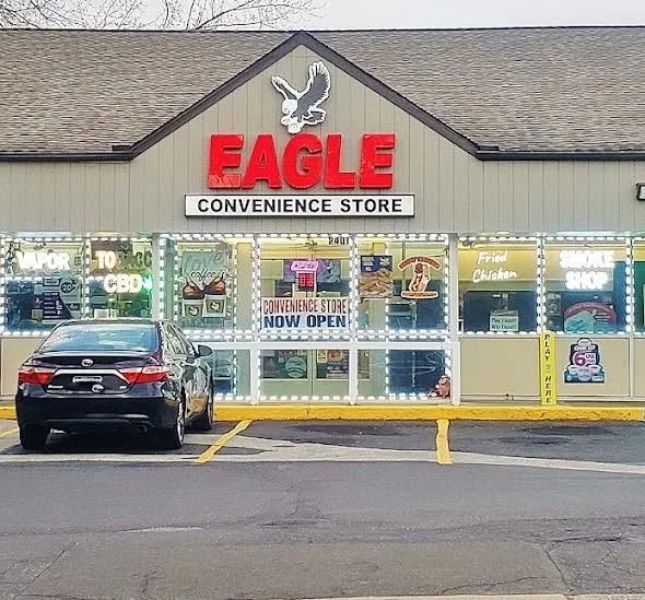 Eagle Smoke & Convenience Shop storefront with red EAGLE signage on Susquehanna Road in Abington, PA